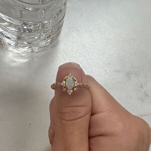 Elegant Gold and Opal Women's Ring